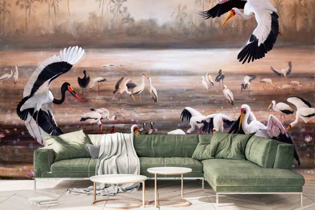 First Light" wall mural: features various birds like storks and herons, misty water landscape, subtle shades of blue and green, accents of white and gray for fog effects, warm undertones of sunrise oranges and golds.