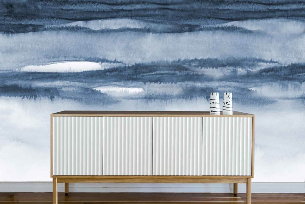 Wallpaper: Abstract blue and white watercolor design, resembling ethereal Sky Dance. Features soft, flowing movements with various shades of blue and hints of white, creating a tranquil and dreamy atmosphere.
