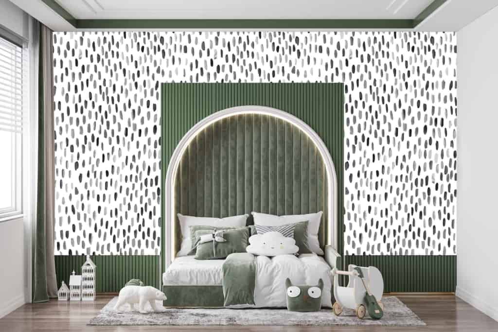 The wallpaper features a mix of white and green, adorned with a spotted pattern. The spots vary in size, creating a playful and engaging backdrop.