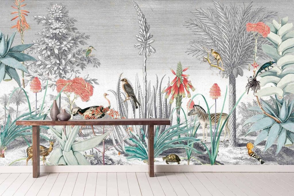 The wallpaper features a vibrant, tropical scene with lush green plants, colorful flowers in shades of red, pink, and orange, animals such as monkeys and leopards, and exotic birds with bright plumage in hues of blue and yellow. The mural adds an enchanting touch with its dynamic composition and vivid colors.