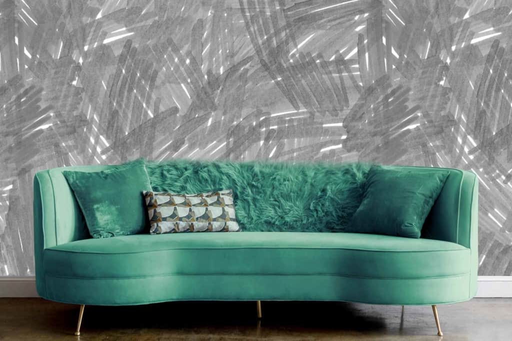 Abstract textured gray wallpaper with various shades of light and dark gray. The design is intricate and visually captivating, creating a clean and contemporary aesthetic.