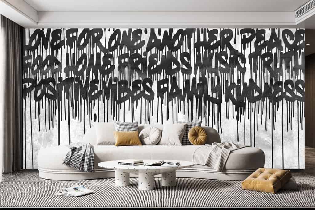 Bold, dripping black graffiti featuring words like "LOVE," "PEACE," and "FAMILY." The design includes vibrant splashes of colors such as red, blue, yellow, and green against a neutral-toned background. Minimalistic backdrop enhances the striking graffiti elements.