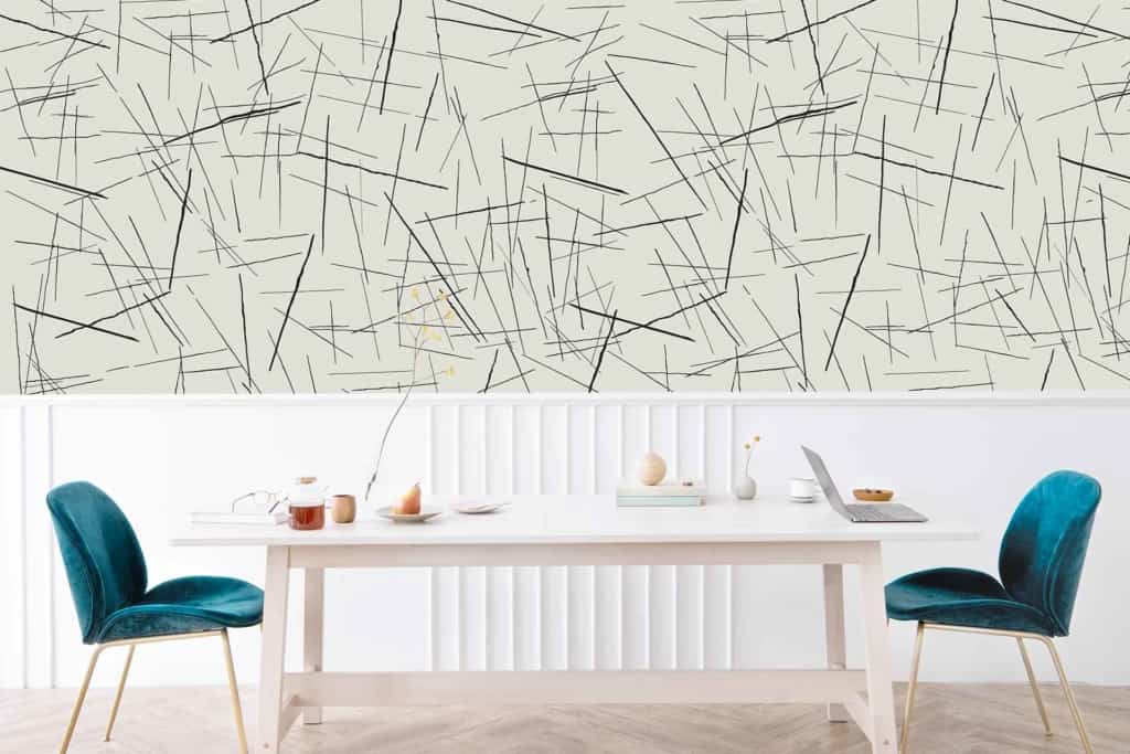 The wallpaper features an abstract pattern of intersecting black lines on a light background. It's minimalistic and modern, using the stark contrast of black against a muted, light backdrop to create a striking design element.