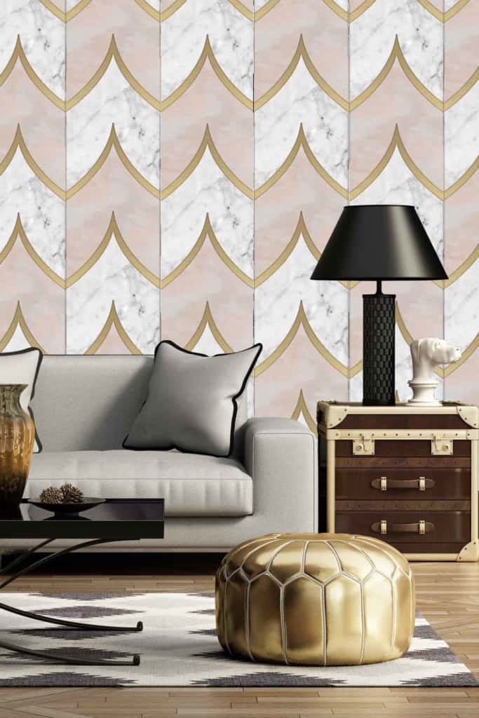 The wallpaper features a geometric chevron pattern with gold, white, and pink elements.