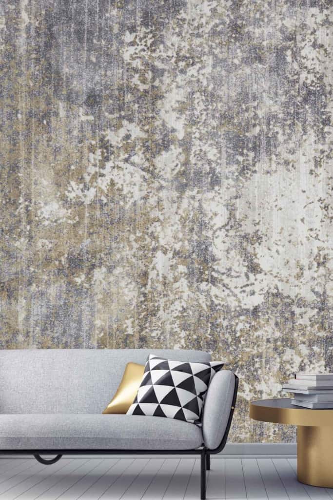 Abstract textured pattern wallpaper with gray, white, and gold tones.