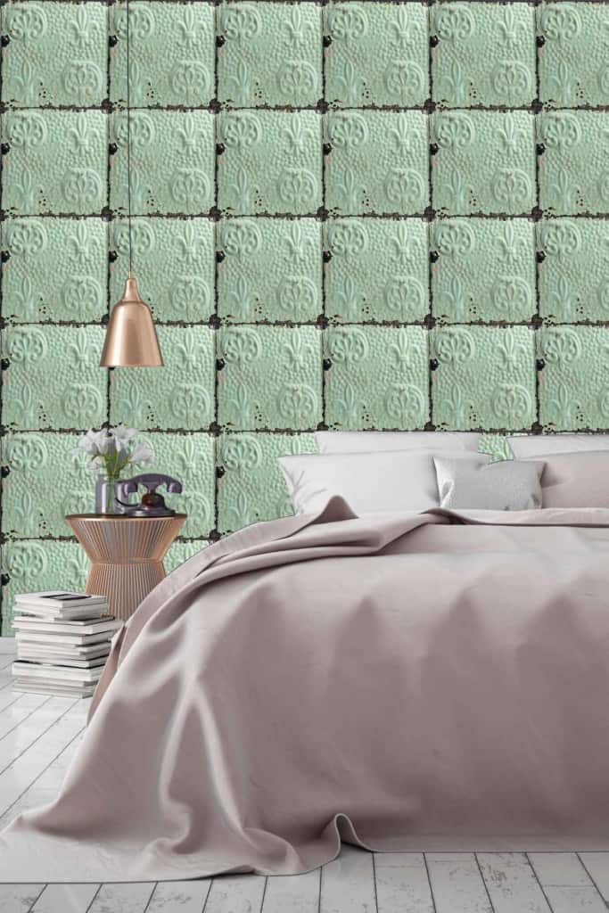 Dorothy's retro-inspired wallpaper in this cozy bedroom showcases a mint green color with an embossed tile pattern.