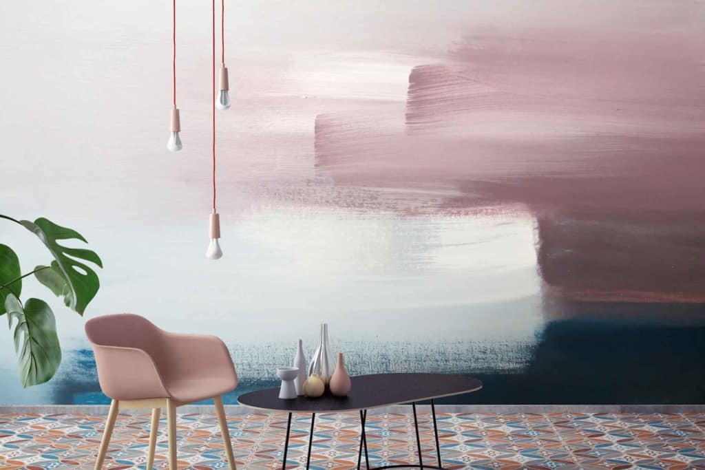 The wallpaper has a pink abstract art mural that features various shades and forms of pink, creating a modern and vibrant atmosphere. This unique design is essential for search functions focusing on "pink abstract art mural wallpaper.