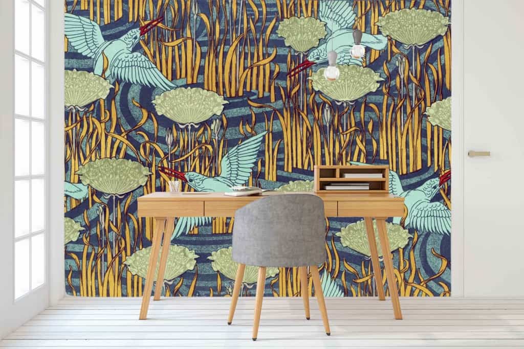 Colorful wall with nature-themed mural featuring kingfisher birds, green plants, and long vertical patterns in yellow and blue.