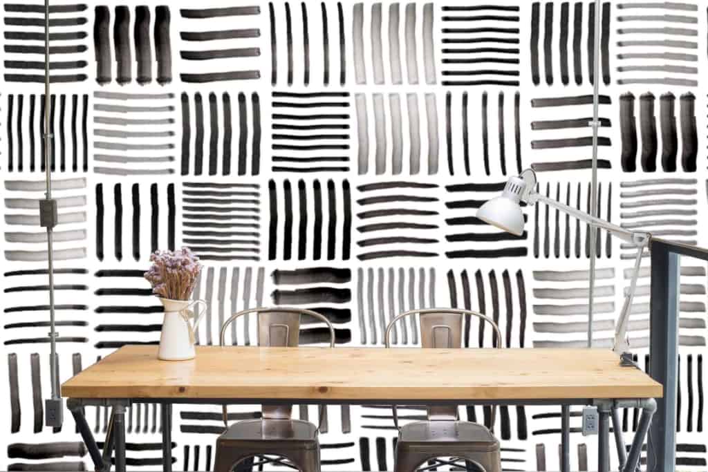 The wallpaper features a black and white abstract pattern with hand-painted stripes. The design emphasizes bold black lines on a white background.