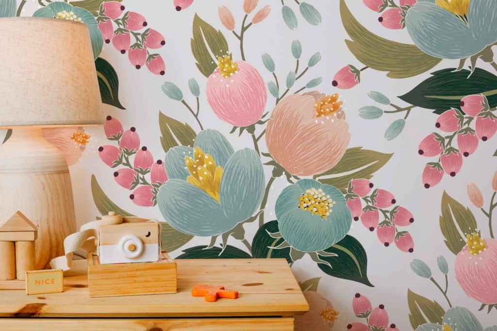 Floral-patterned wallpaper, pastel colors, posy pink flowers, blue flowers, green flowers, yellow accents.