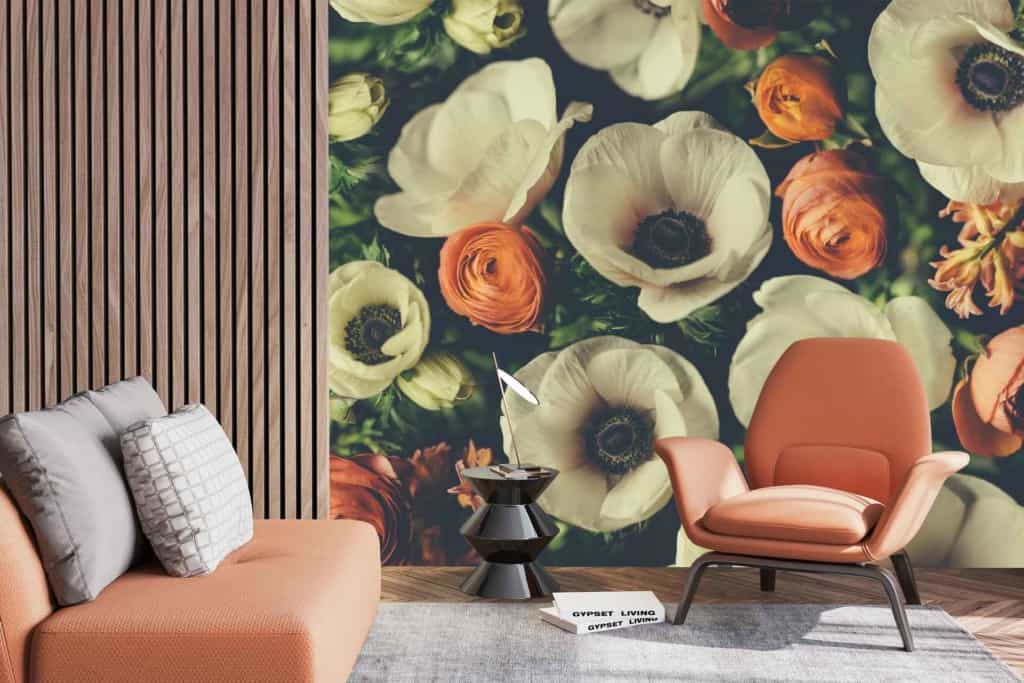 Wooden slat accent wall with a large floral mural. Vibrant mix of white and orange flowers, seasonal update in the mural.