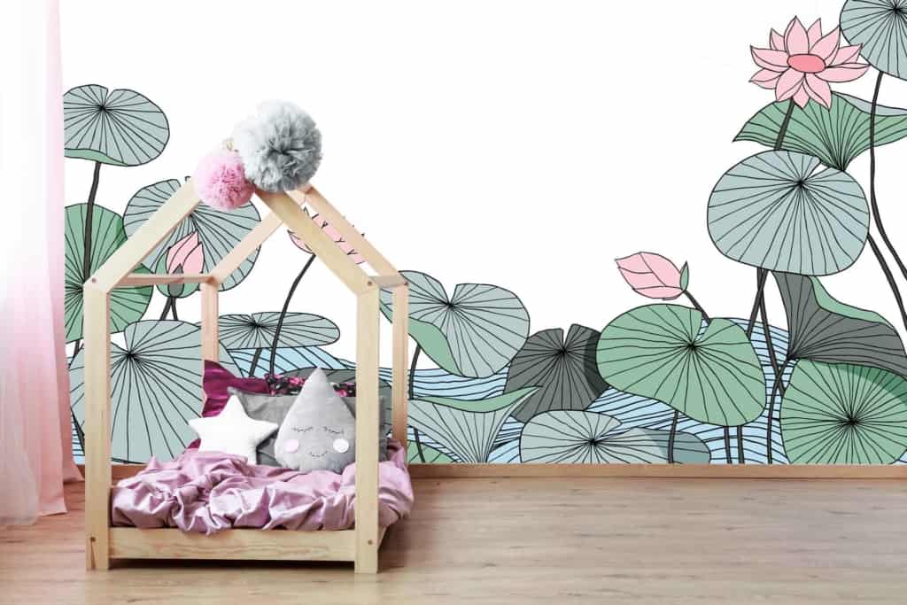 Large mural wallpaper featuring green lily pads and pink lotus flowers. Whimsical, nature-inspired theme.