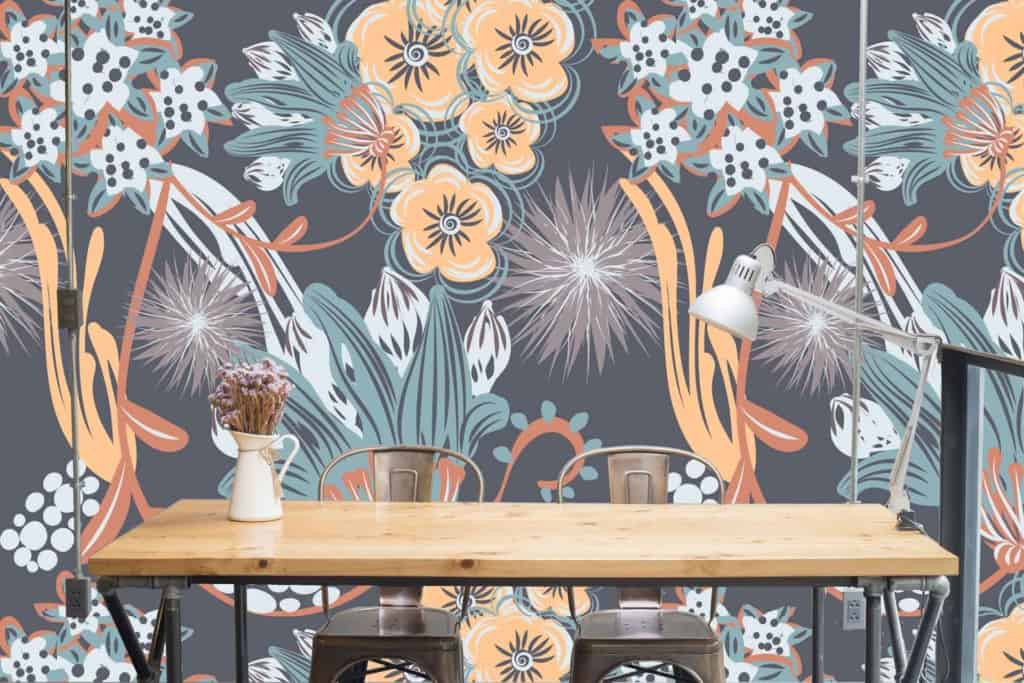 Vibrant floral-patterned wallpaper, featuring bold flowers, lush greenery, vivid colors like reds, pinks, yellows, and deep greens. Modern design with dynamic contrasts and intricate details.