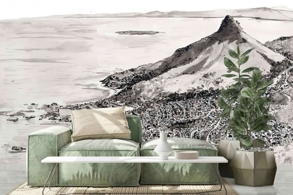 Grayscale mural of Camps Bay's coastal landscape, featuring a prominent mountain and sea.