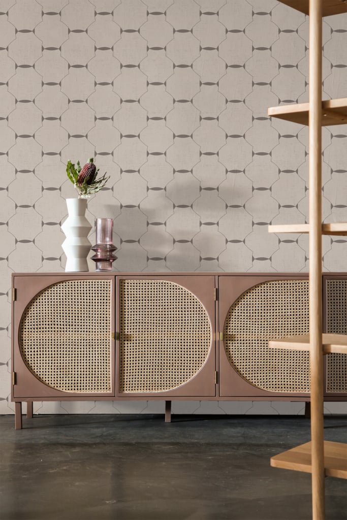 Hexagonal-patterned wallpaper featuring a mix of soft beiges, muted grays, and subtle whites.