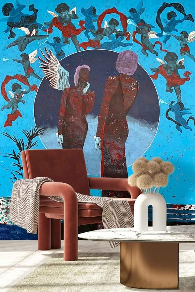 The wallpaper features a vibrant mural with two abstract human figures in bold red. These central figures are surrounded by smaller, dynamic silhouettes in motion, creating a sense of energy and movement. The background is filled with varying shades of blue, enhancing the overall contrast and making the red figures pop. This lively and colorful design serves as a striking focal point in the contemporary living space.