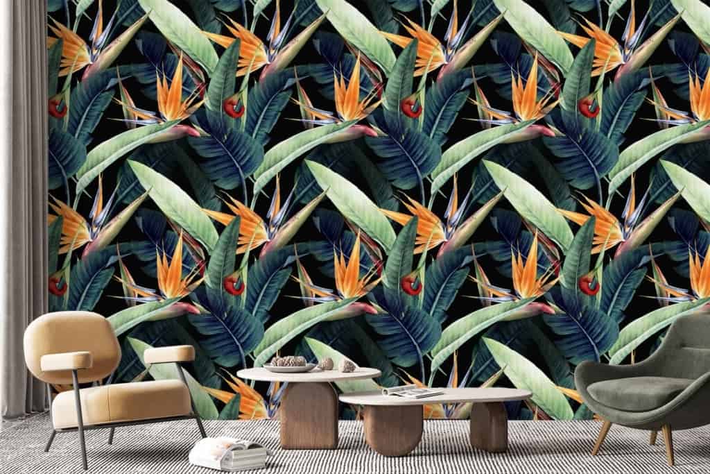 The wallpaper showcases bold, vibrant bird of paradise flowers in striking oranges and reds, set against a backdrop of lush green leaves. The tropical theme is accentuated with intricate details and vivid colors, making it a focal point in the room.