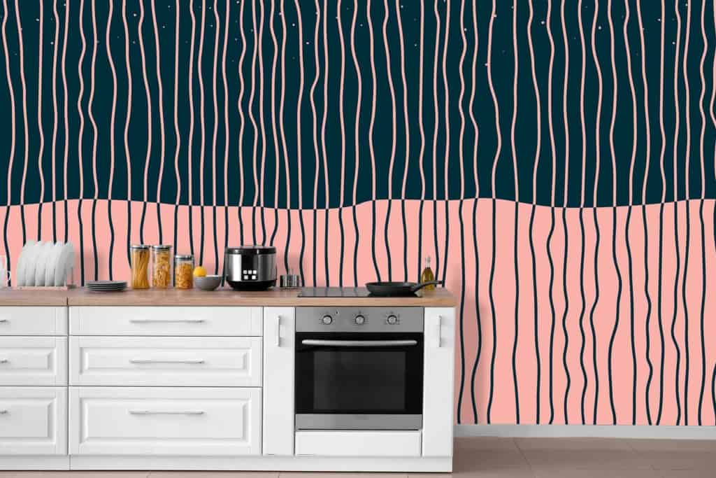 The wallpaper features a striking abstract design perfect for a modern kitchen. It showcases wavy lines in two vibrant colors: pink on the lower half and green on the upper half.