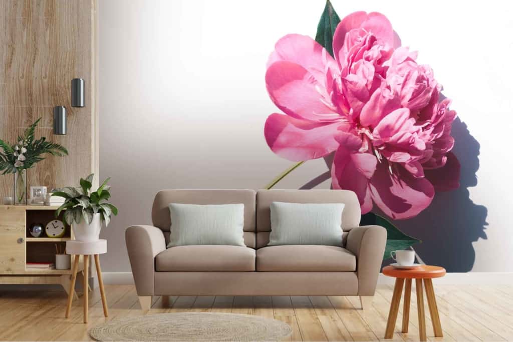 The wallpaper features a large, vivid mural of a pink peony flower with green leaves, curated by Sadie.