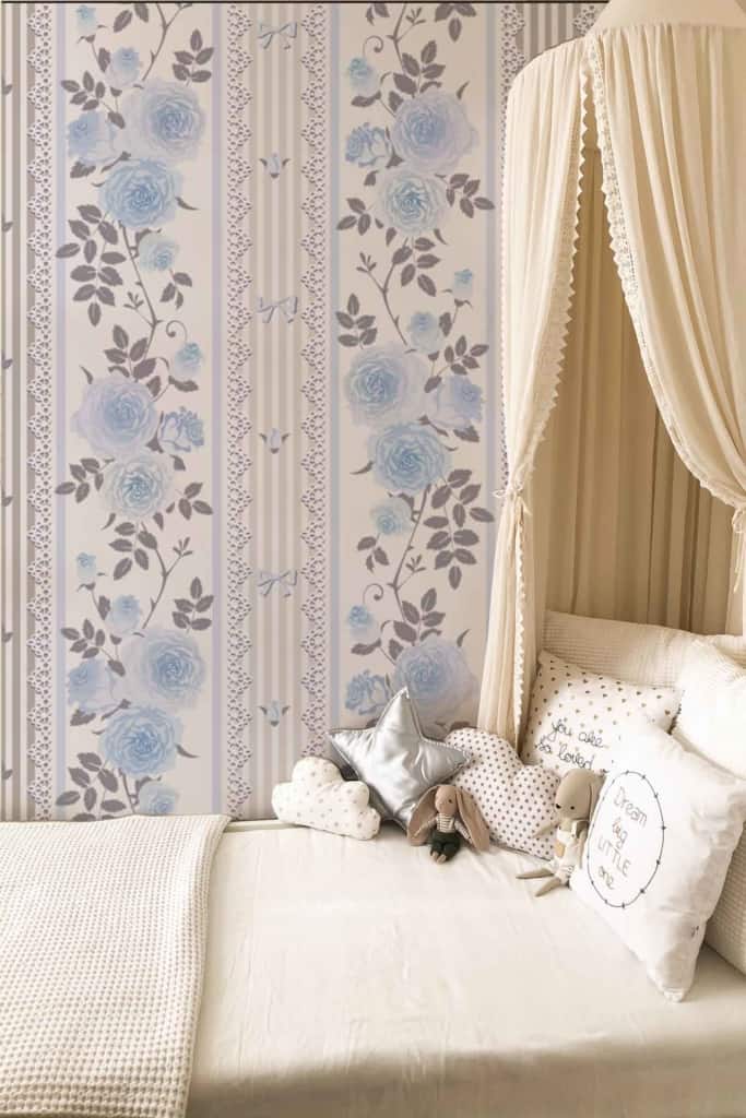 The wallpaper features vertical stripes and blue floral patterns. Key elements include:

- Vertical Stripes
- Blue Floral Patterns
- Combination of Blue and Cream Colors