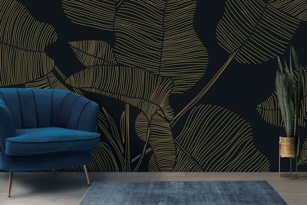Dark wall with a bold gold leaf pattern