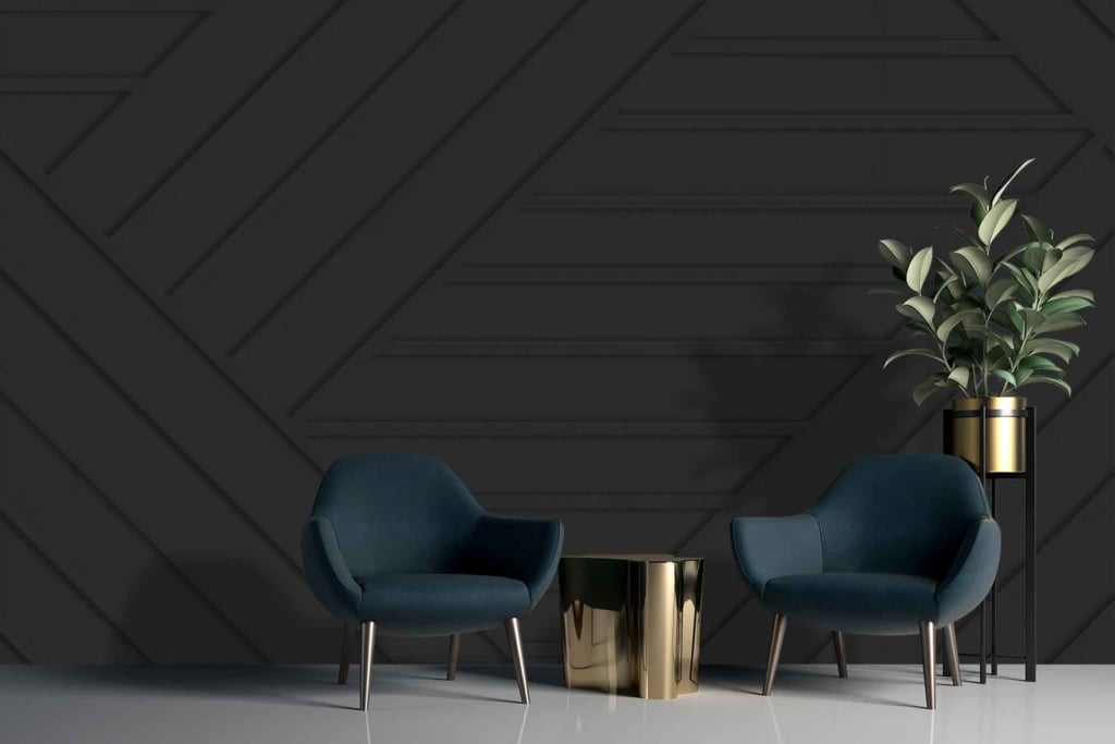 Dark geometric patterned wallpaper with a striking leaf artwork complementing the design.