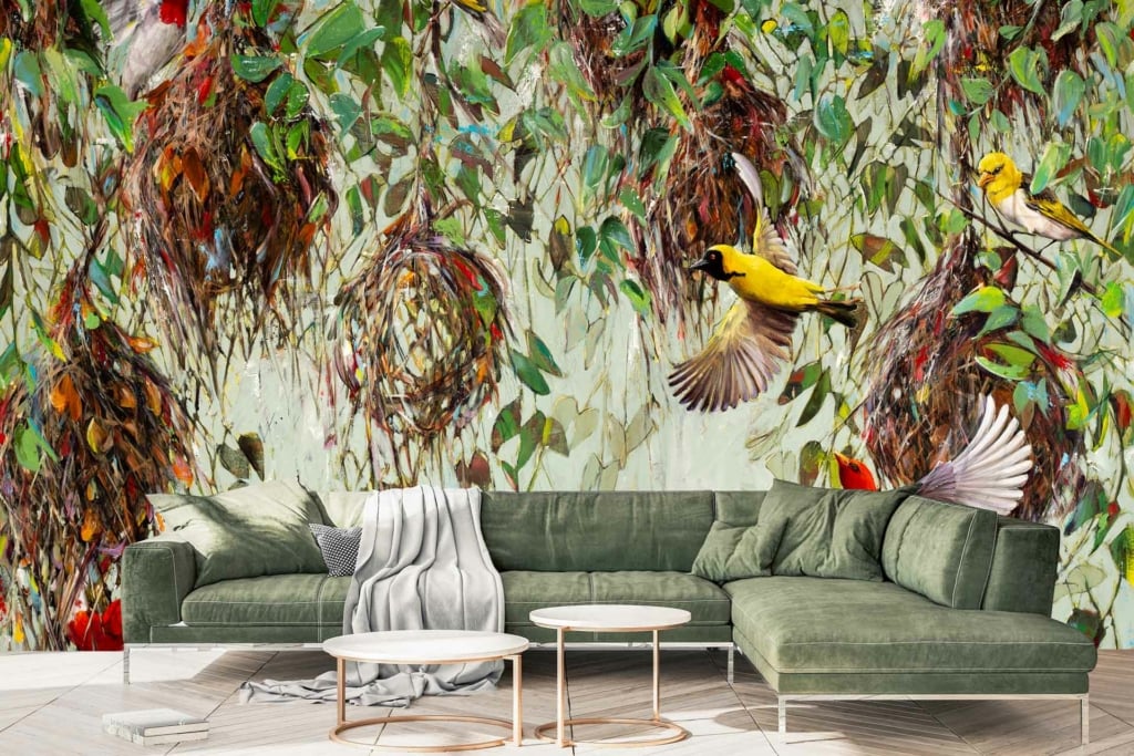 The mural features colorful birds, green leaves, and brown branches in a lush forest scene. It creates a lively, nature-inspired atmosphere with vibrant hues and detailed natural elements.