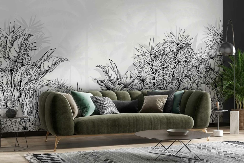 The wall features intricate black-and-white botanical murals. The wallpaper showcases detailed illustrations of leaves, flowers, and vines in monochromatic tones.