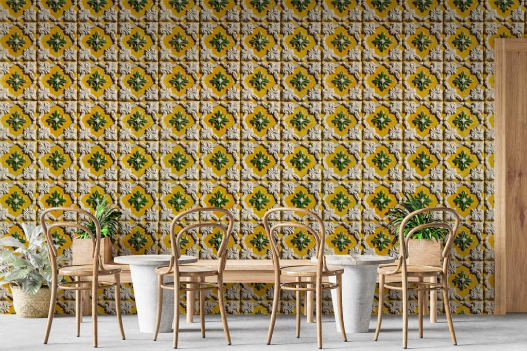 The wallpaper features vibrant yellow and green geometric shapes. These elements create a lively and colorful backdrop for the dining area, adding an energetic touch to the space. Keywords: yellow, green, geometric shapes, patterned wall.