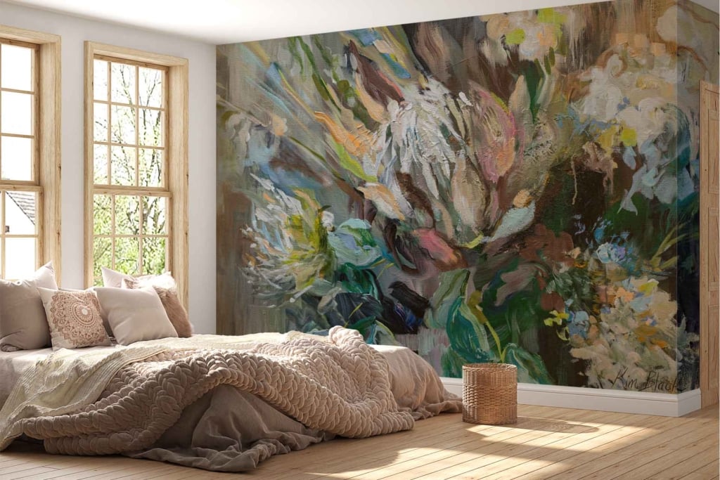 Floral mural wallpaper featuring large, vibrant blooms in shades of pink, orange, and red with lush green leaves. Subtle details include delicate tendrils and soft pastel accents. The background is a light cream color, providing a bright and airy feel.