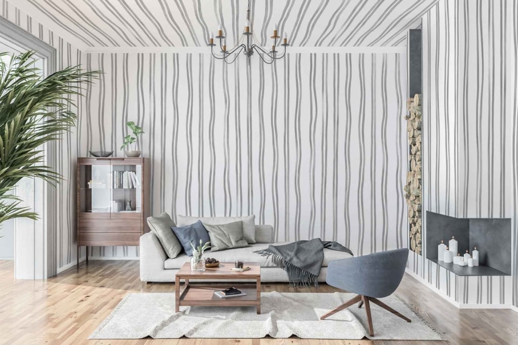 The wallpaper in the modern living room features wavy stripes. The colors within these stripes include shades of green, grey, and white.