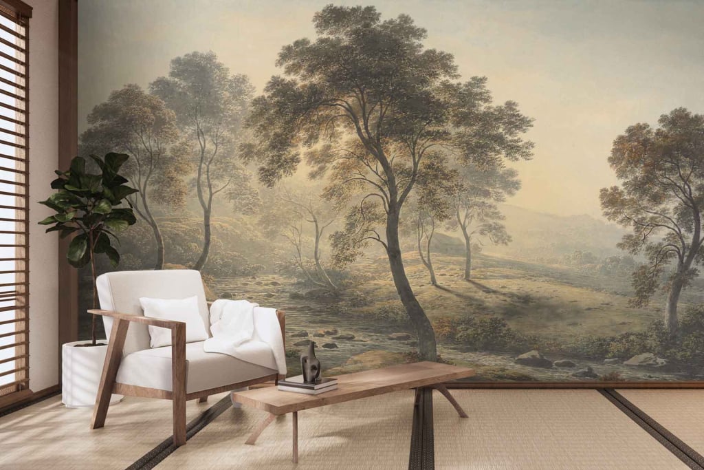 A serene room with a landscape mural featuring tall trees in various shades of green, and rolling hills bathed in the soft glow of golden hour hues, including warm yellows and soft oranges. The mural's elements create a tranquil ambiance with its depiction of nature and calming colors.