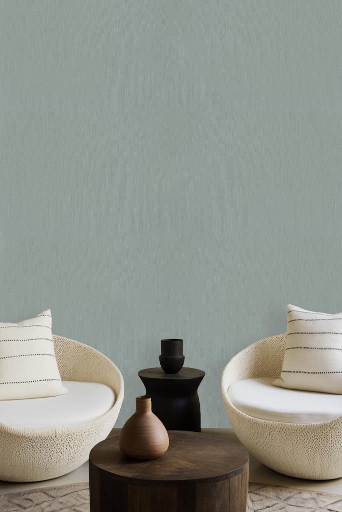 Wallpaper features a muted green color, evoking eventide serenity.