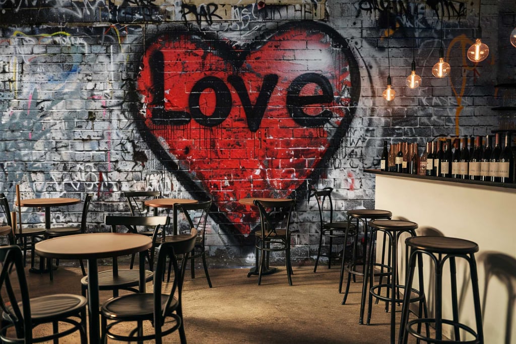 Graffiti-style mural, brick wall, red heart, "Letter to My Love" text, urban art elements.
