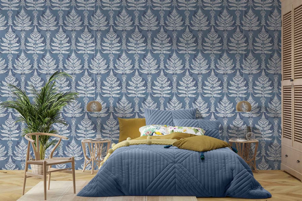 The bedroom in Ferndale features a blue and white leafy patterned wallpaper. Key elements: **blue and white**, **leafy patterns**.