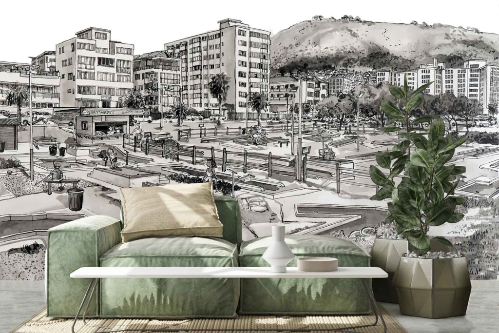 Detailed black-and-white mural, cityscape, buildings, hill.