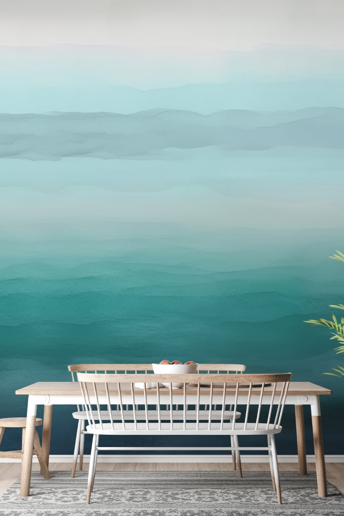 Wall with a gradient blue ocean wave painting: features dynamic shades of blue, aqua, and turquoise that mimic the natural flow of ocean waves. Subtle white accents suggest sea foam and surf.