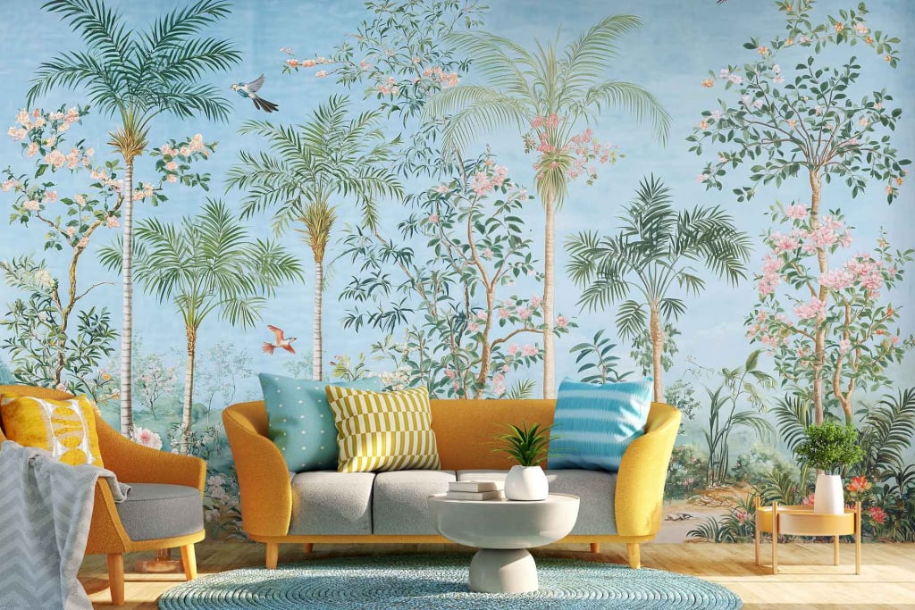 The wall mural showcases a tropical theme with lush green palm trees and vibrant colorful birds, such as parrots and toucans, against a clear blue sky. The scene is filled with lively hues of emerald, azure, and vivid splashes of red, yellow, and orange from the birds' plumage, creating an energizing focal point.
