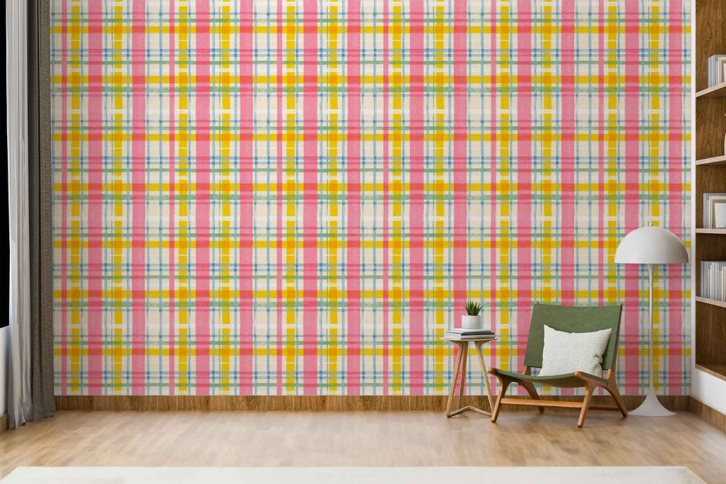 Colorful plaid-patterned wallpaper featuring various colors in intersecting lines and squares.