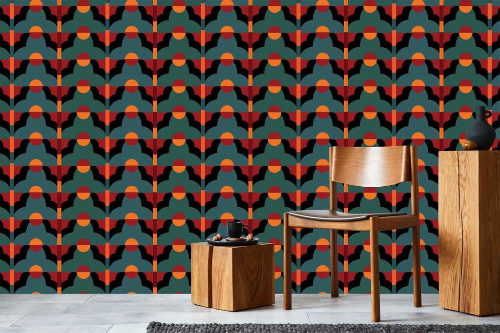 Geometric pattern wallpaper; stylized shapes; colors: green, red, orange, yellow.