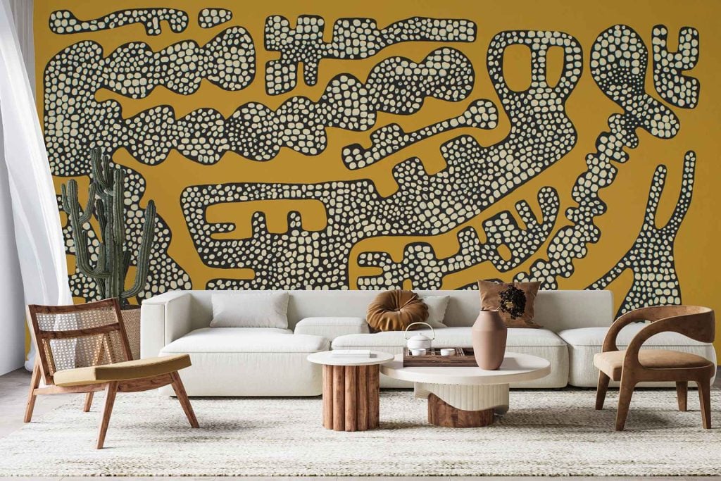 Bold abstract mural, black and white patterns, mustard yellow background.