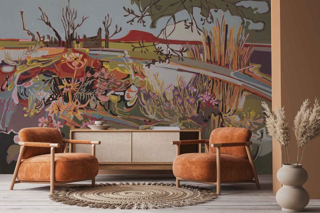 Vibrant abstract Karoo landscape wallpaper featuring bold brushstrokes, warm earthy tones like ochre, terracotta, and sage green, with hints of muted blue and gold; depicts rolling hills, stylized mountains, and expansive skies for a modern artistic look.