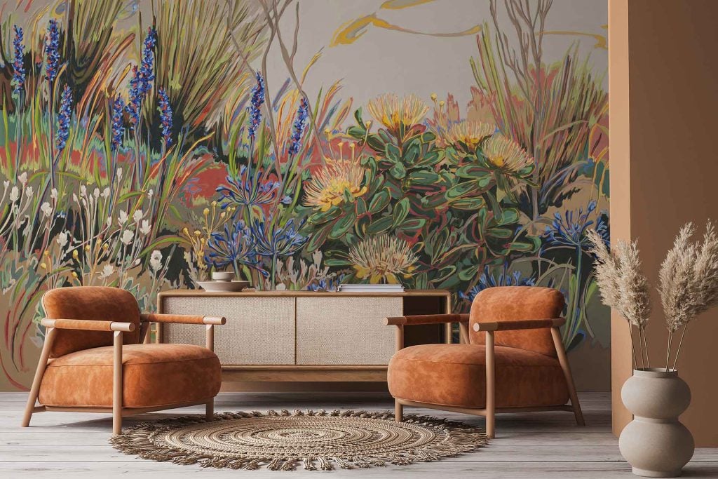 Vibrant wallpaper featuring colorful wildflowers, lush greenery, and striking Agapanthus flowers in shades of purple, pink, yellow, and green. Nature-inspired mural with botanical elements and bold floral patterns.