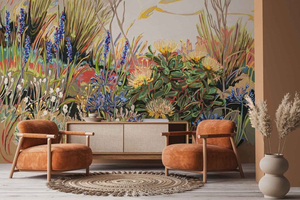 Vibrant wall mural wallpaper features wildflowers, everlastings, and grasses in an array of colors, including greens, yellows, pinks, and whites, creating a lively botanical backdrop.