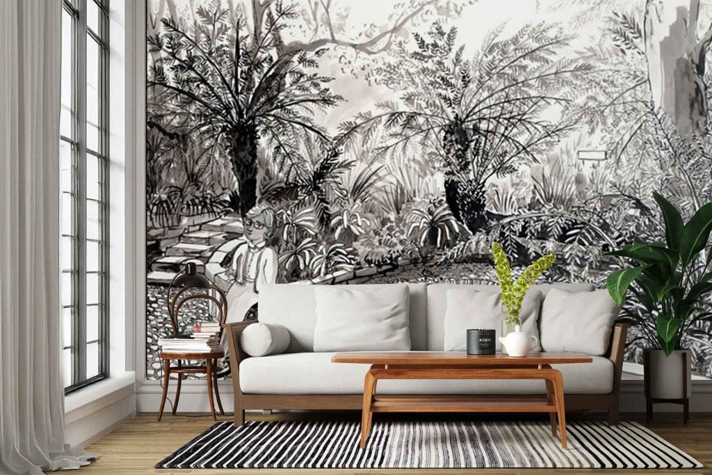 Black and white mural wallpaper featuring a lush forest scene with intricate foliage, tall trees, leafy branches, and dense undergrowth. The design is reminiscent of Bokaap’s charm, with bold monochrome contrasts and detailed botanical patterns.