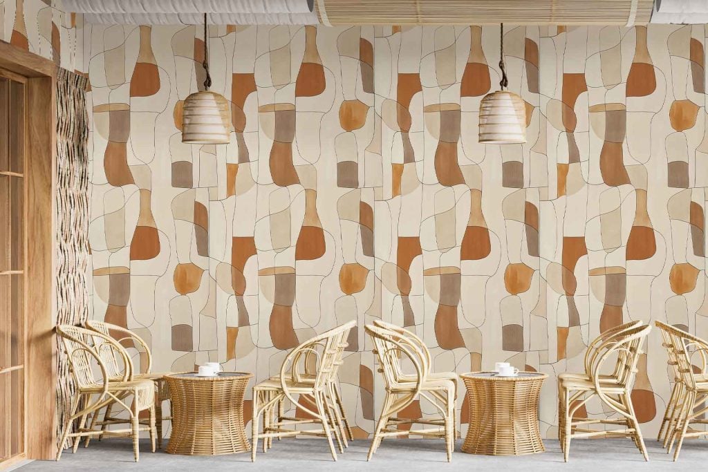 Abstract mid-century modern wallpaper in beige, brown, and tan tones; features organic shapes and geometric forms. Bold, repeating patterns with curves and lines evoke 1950s style. Warm neutral color palette dominates the design.