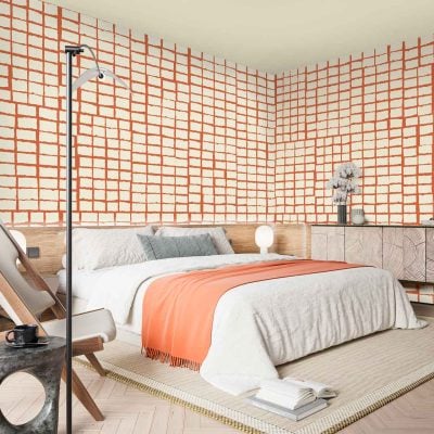 The wallpaper features a modern grid pattern composed of crisp, Orion white squares intersected by bold orange lines, creating a striking geometric design. The main elements are straight horizontal and vertical orange lines on a clean white background, forming a uniform and minimalist grid motif throughout the surface. Colors: bright white (Orion), vivid orange.