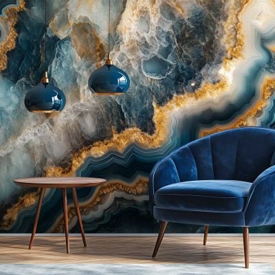 Striking wall mural featuring swirling blue, gold, and white marble patterns with fluid veining, shimmering metallic accents, and bold abstract textures; colors include deep cobalt blue, navy, rich gold, pearly white, and hints of teal.