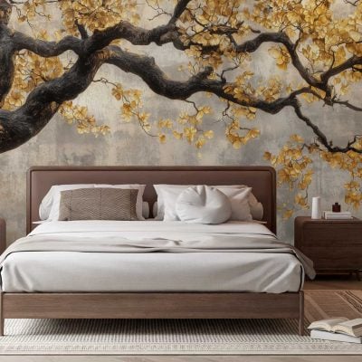 The wallpaper features a striking mural of a tree branch adorned with golden leaves set against a soft, neutral background. The design highlights delicate branches, shimmering gold accents, and subtle earth tones, creating an artistic and serene focal point for the room.