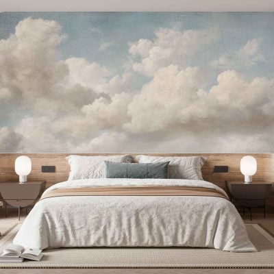 The wallpaper features a modern cloud mural in soft, neutral tones—primarily beige, white, and warm greys. The design showcases gentle, painterly clouds with subtle gradients and blurred edges for a calming, dreamy effect. Hints of cream and taupe add depth without overpowering the minimalist aesthetic.